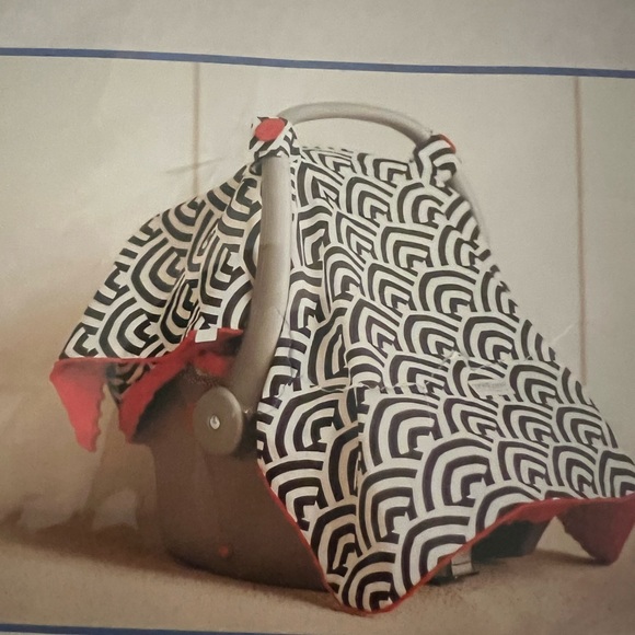 New in package car seat cover. Black, white and red. One size fits most - Picture 2 of 3